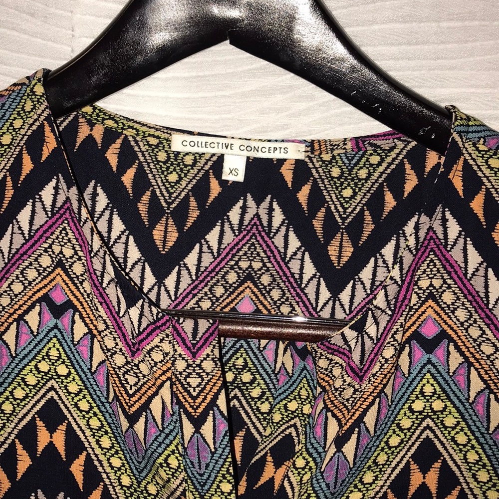 Collective Concepts XS dress with pockets.